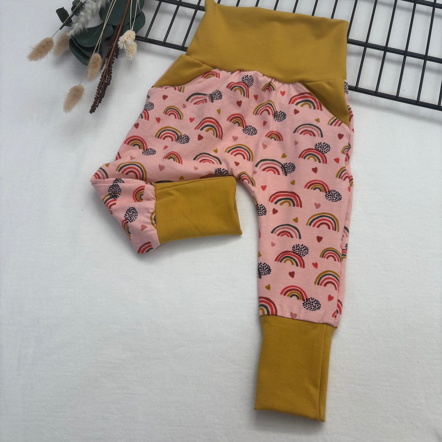 Pantalon évolutif Mignon arc-en-ciel fond rose 3-12 mois