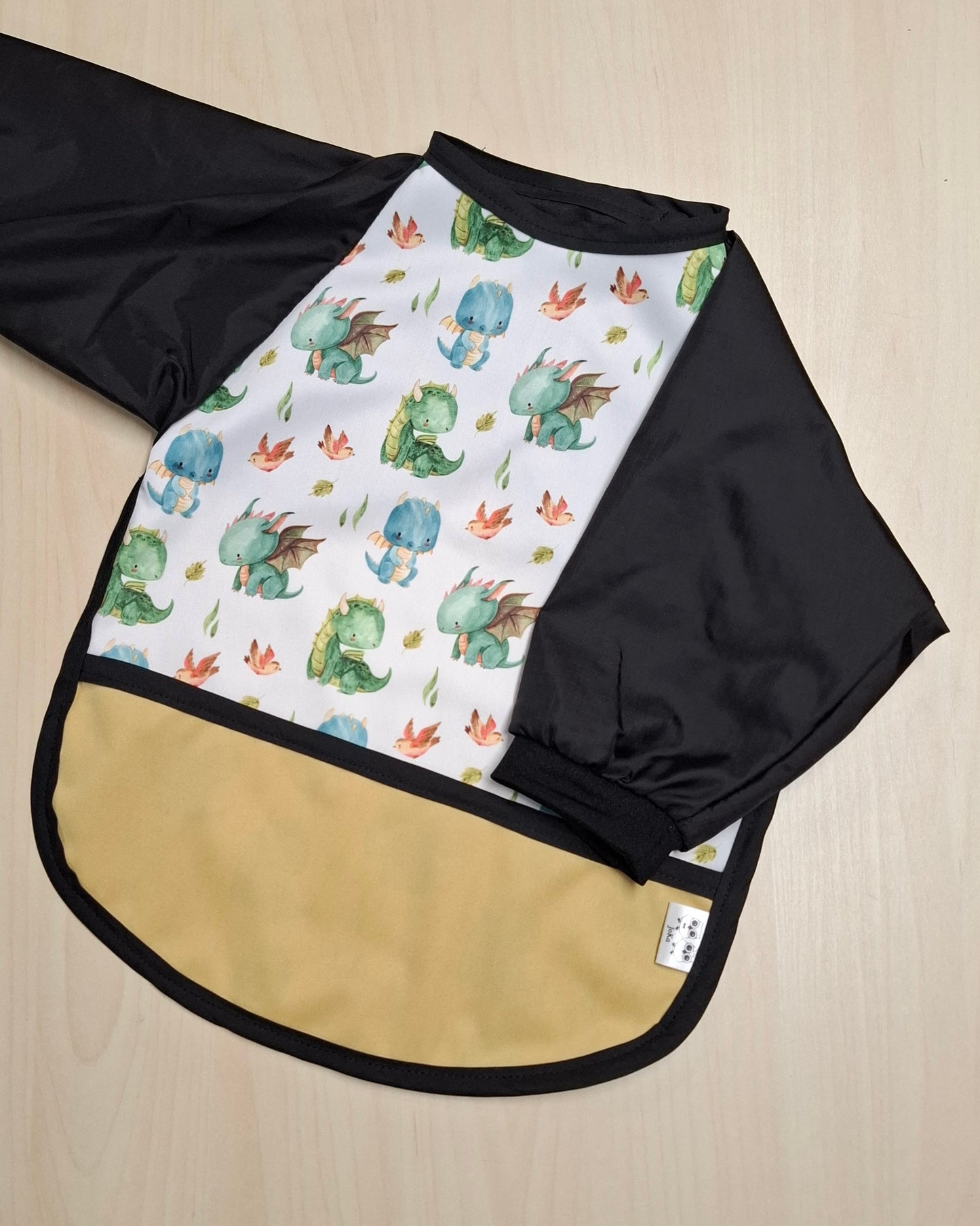 Bavette / tablier à manches Bébés dragons